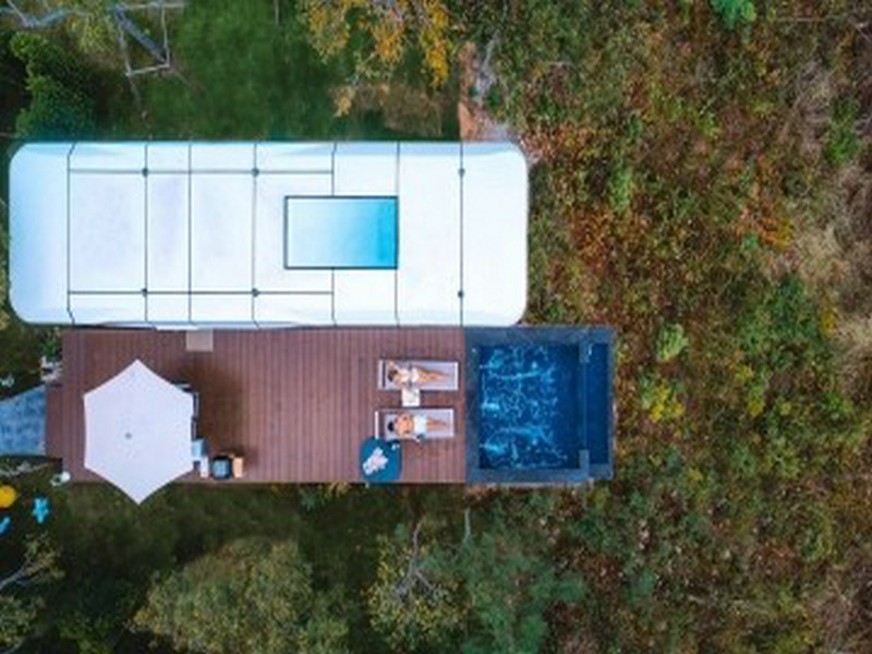 Self-sustaining tiny home with balcony with Turkish bath facilities